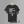A black short-sleeve t-shirt. The shirt features a white printed quote from Proverbs 13:16 about making a choice, with 'freewill' written in script and a small white circle containing the number 80.