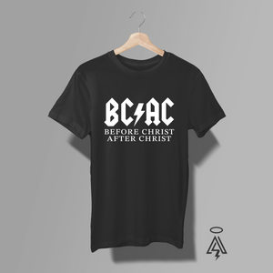 Before Christ.
After Christ.
Two eras. One life-changing moment.
This black graphic tee flips a legendary rock-style logo into a powerful testimony piece. Designed with sharp, high-voltage lettering and a lightning bolt strike through the middle, the bold BC/AC graphic delivers instant stage-ready attitude—while the message underneath makes it crystal clear:
