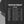 A close-up of a black T-shirt with a white printed list of Compton Terrace Concert list with dates, shown on a model against a dark background.