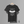 A black short-sleeve t-shirt. The shirt features a white graphic print on the front with the text 'Compton Terrace' and coordinates, along with a stylized concert lawn design.