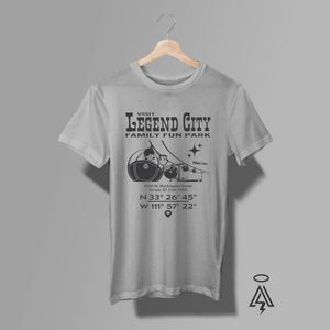 Heather gray t-shirt with 'Legend City Family Fun Park' design on a hanger against a gray background