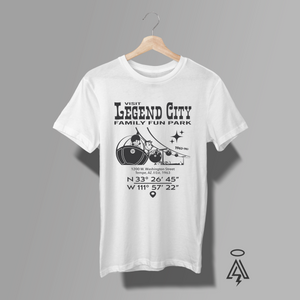 White t-shirt with 'Legend City Family Fun Park' design on a hanger against a gray background