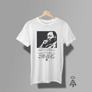 White t-shirt with a graphic of Martin Luther King Jr.- I have a dream and coordinates.