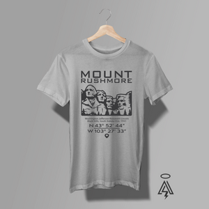 Gray t-shirt with Mount Rushmore graphic and coordinates below it.