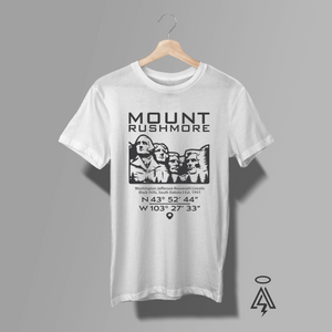 White t-shirt with Mount Rushmore design with coordinates below it.