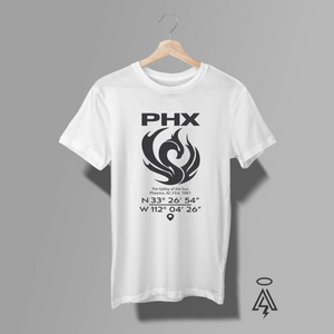 Rise with the city that never stops reinventing itself in the PHX – Valley of the Sun Tee — a bold tribute to Phoenix, Arizona’s grit, heat, and unstoppable energy. Front and center, a striking black phoenix spreads its wings in a powerful upward sweep, its feathers flowing into flame-like curves and sun rays.  